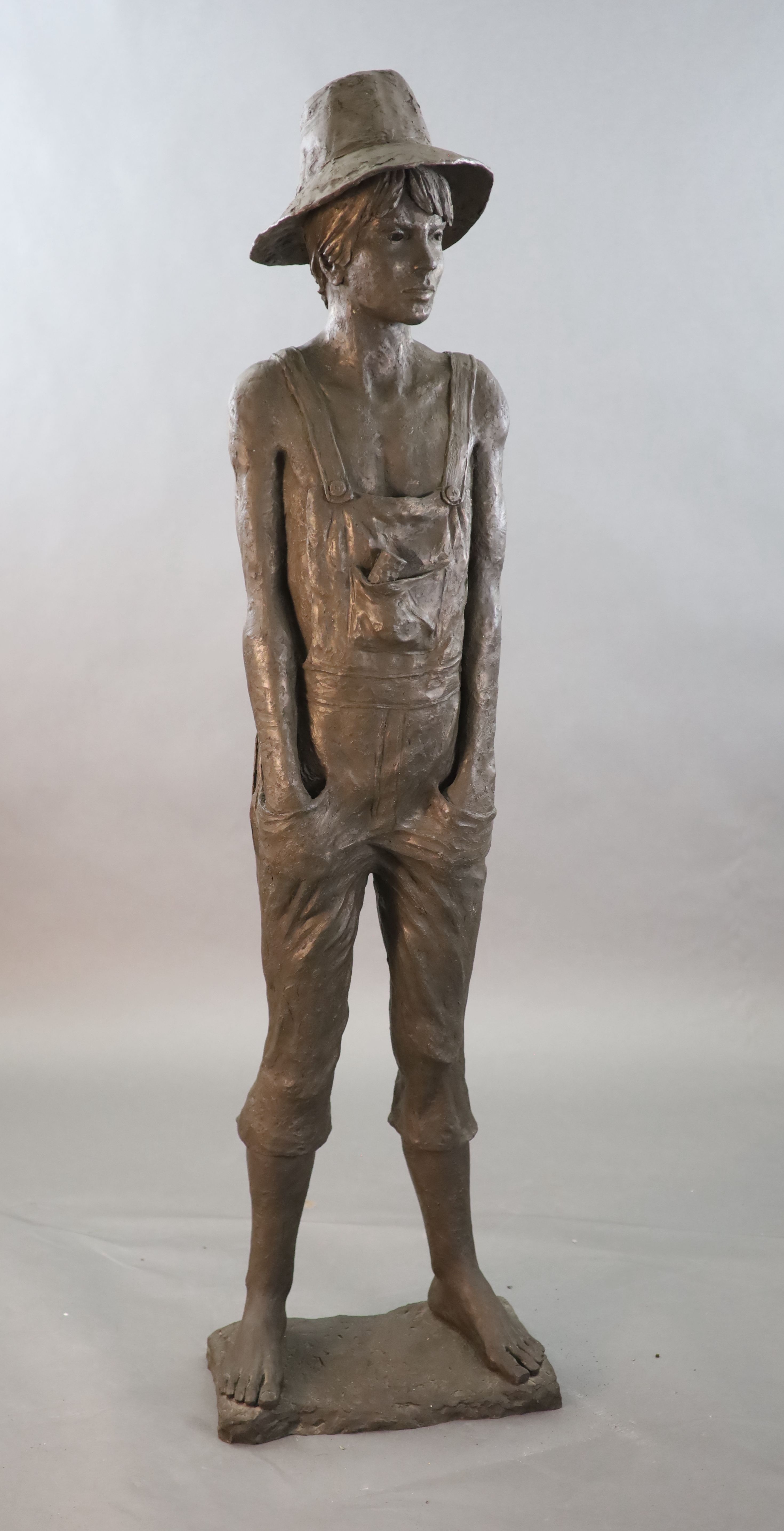 A Neil Godfrey bronzed composition life size figure of Tom Sawyer, height 5ft 2in.